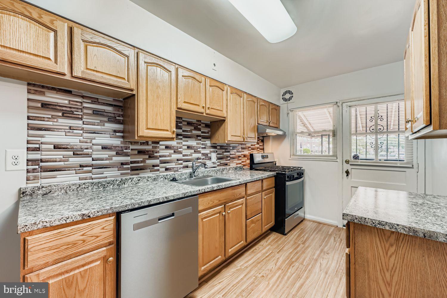 5466 Addington Road Baltimore, MD 21207 - Photo 11 of 31 Modern kitchen with stylish finishes.
