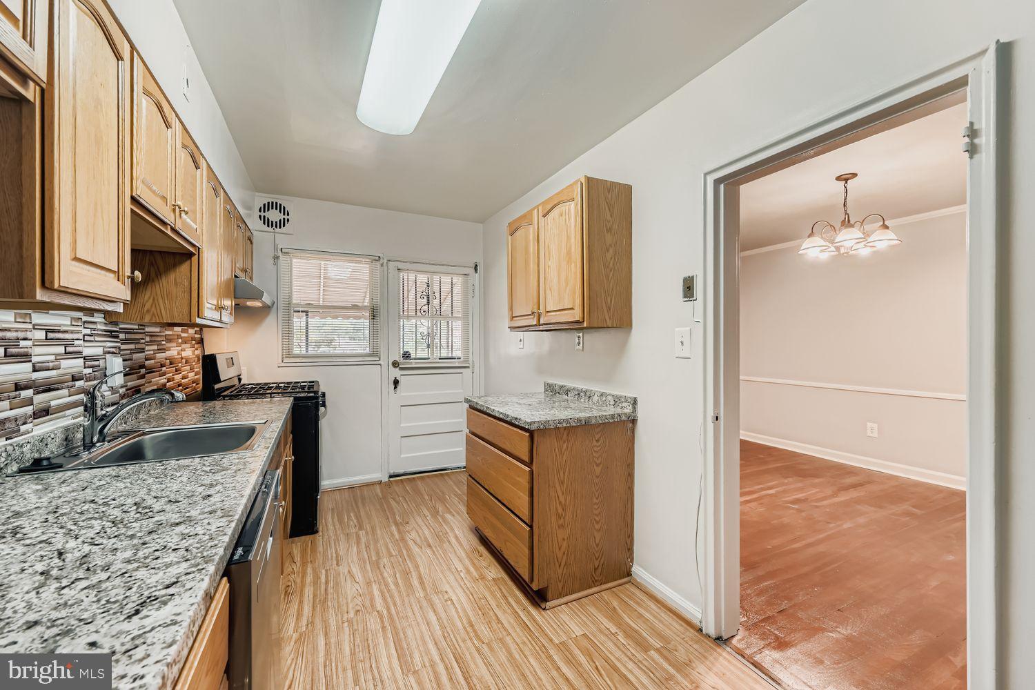 5466 Addington Road Baltimore, MD 21207 - Photo 12 of 31 Updated kitchen has plenty of counter space.