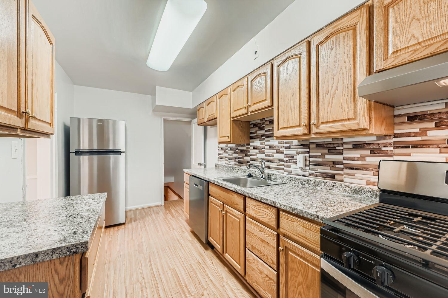 5466 Addington Road Baltimore, MD 21207 - Photo 13 of 31 Modern kitchen with new Stainless Steel Appliances
