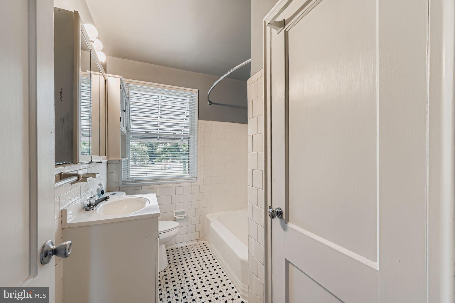 5466 Addington Road Baltimore, MD 21207 - Photo 17 of 31 Recently updated bathroom with classic charm.