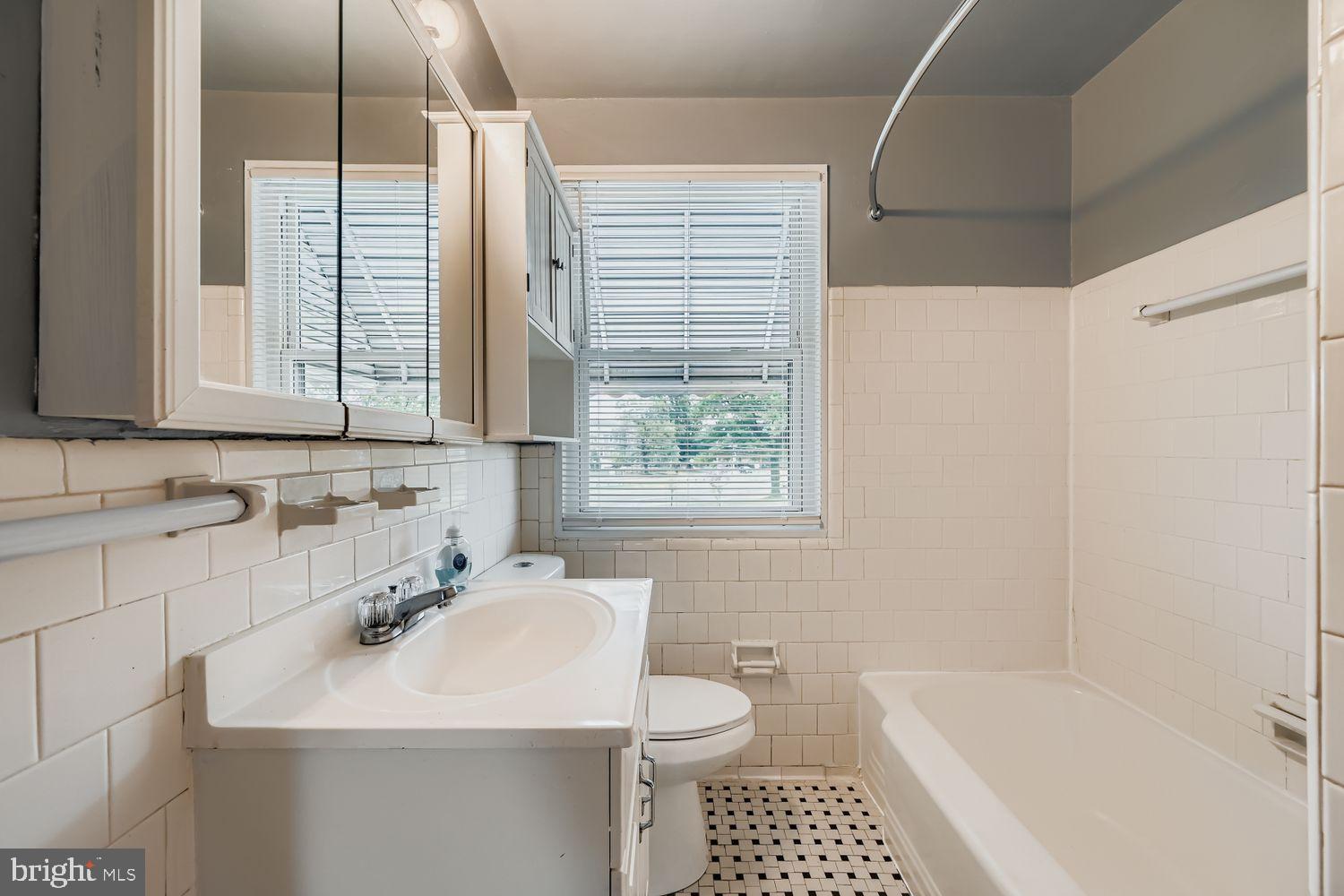 5466 Addington Road Baltimore, MD 21207 - Photo 18 of 31 Bright and airy bathroom with modern touches.