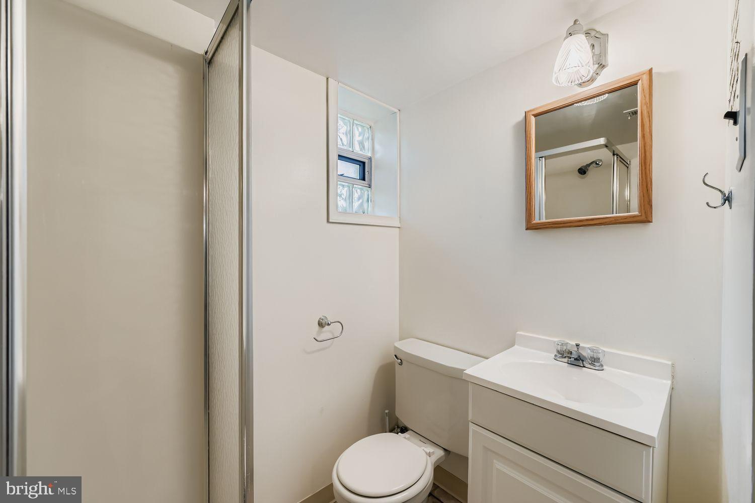 5466 Addington Road Baltimore, MD 21207 - Photo 23 of 31 Bright and airy bathroom with modern fixtures.
