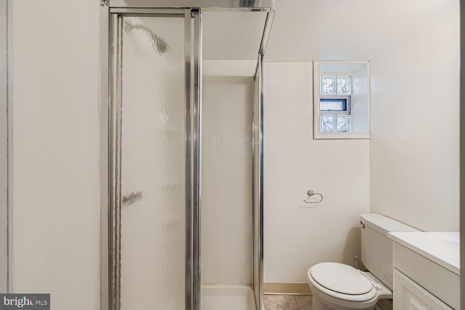 5466 Addington Road Baltimore, MD 21207 - Photo 24 of 31 Modern bathroom with sleek fixtures.