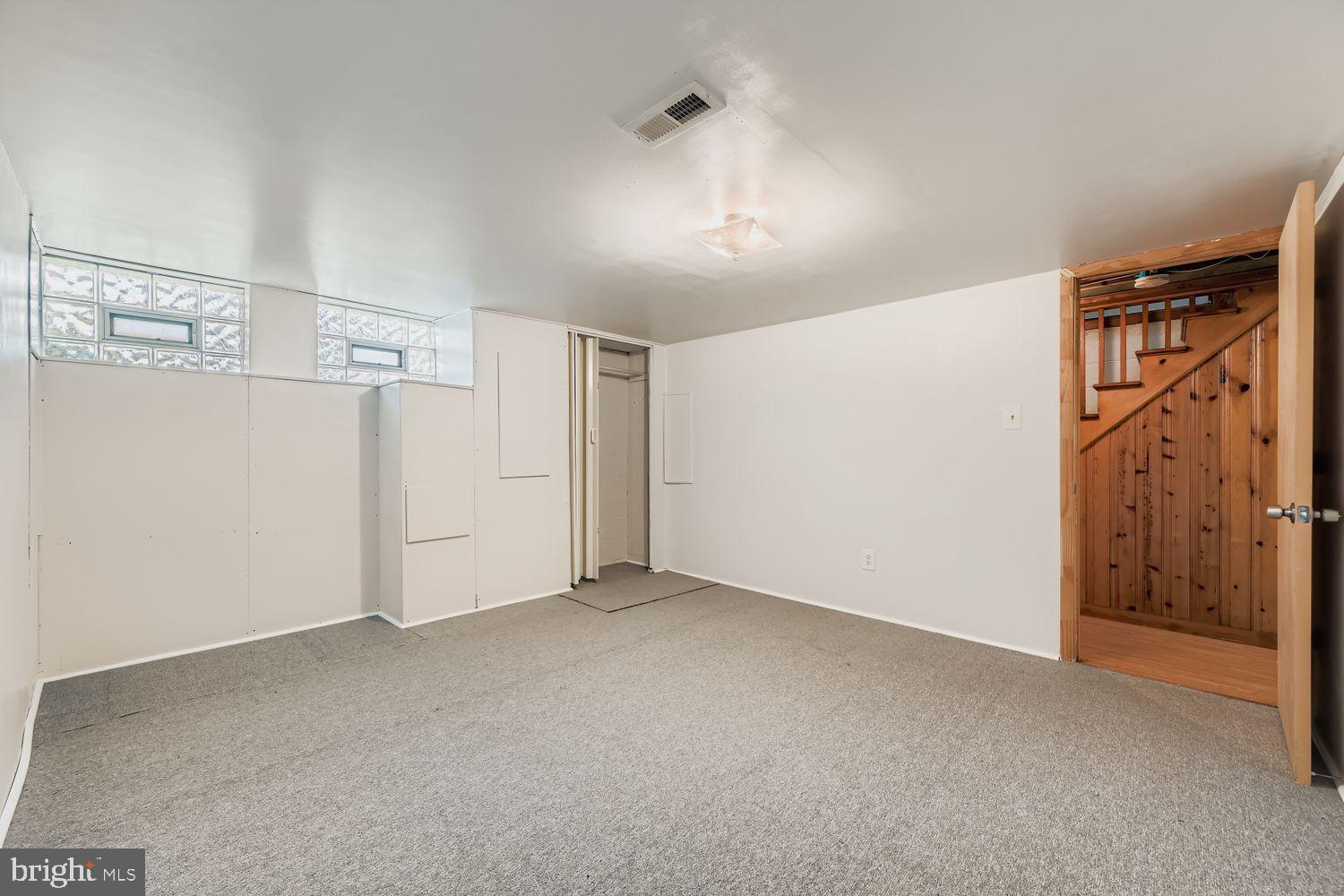 5466 Addington Road Baltimore, MD 21207 - Photo 27 of 31 Versatile basement space with natural light.
