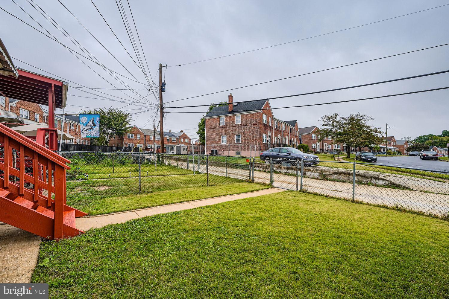 5466 Addington Road Baltimore, MD 21207 - Photo 30 of 31 Charming neighborhood with lush green space.