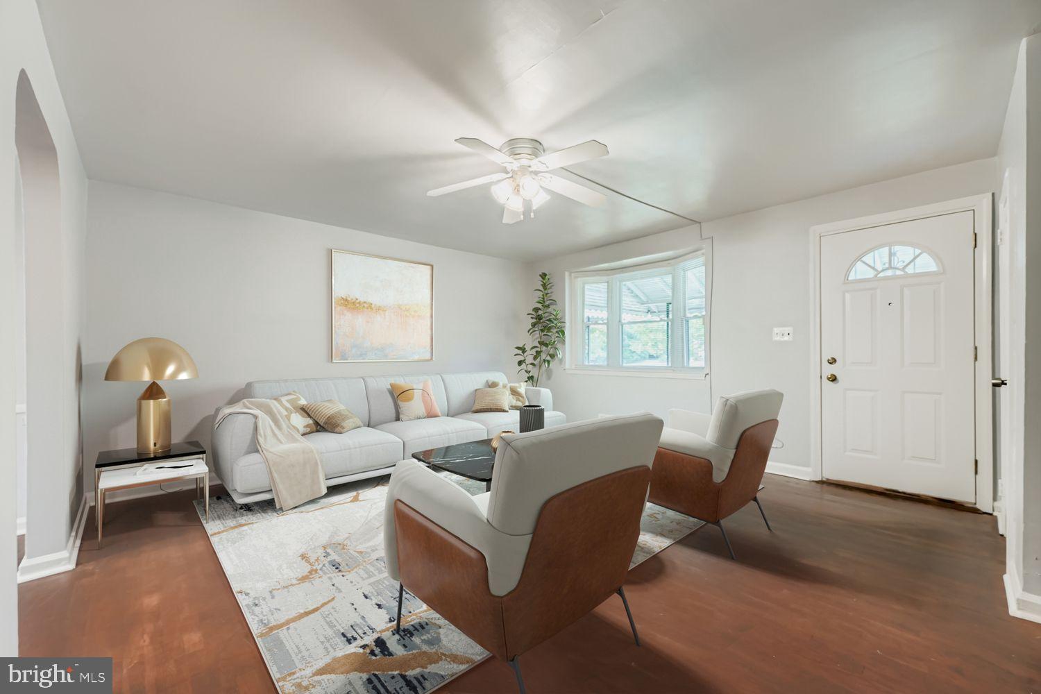 5466 Addington Road Baltimore, MD 21207 - Photo 6 of 31 Virtual Staging of large and airy Living Room.