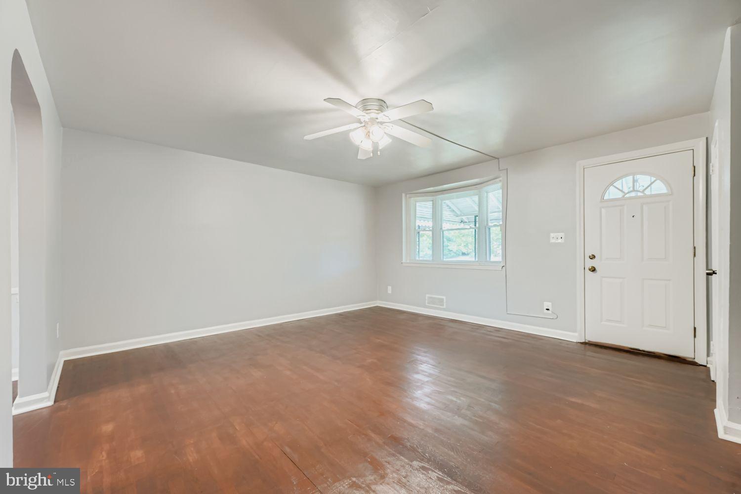 5466 Addington Road Baltimore, MD 21207 - Photo 7 of 31 Bright and airy entryway with hardwood floors.