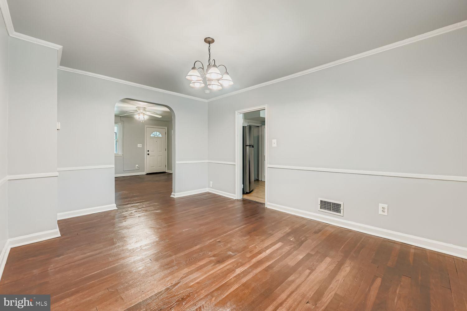 5466 Addington Road Baltimore, MD 21207 - Photo 10 of 31 Spacious, light-filled living area awaits you.