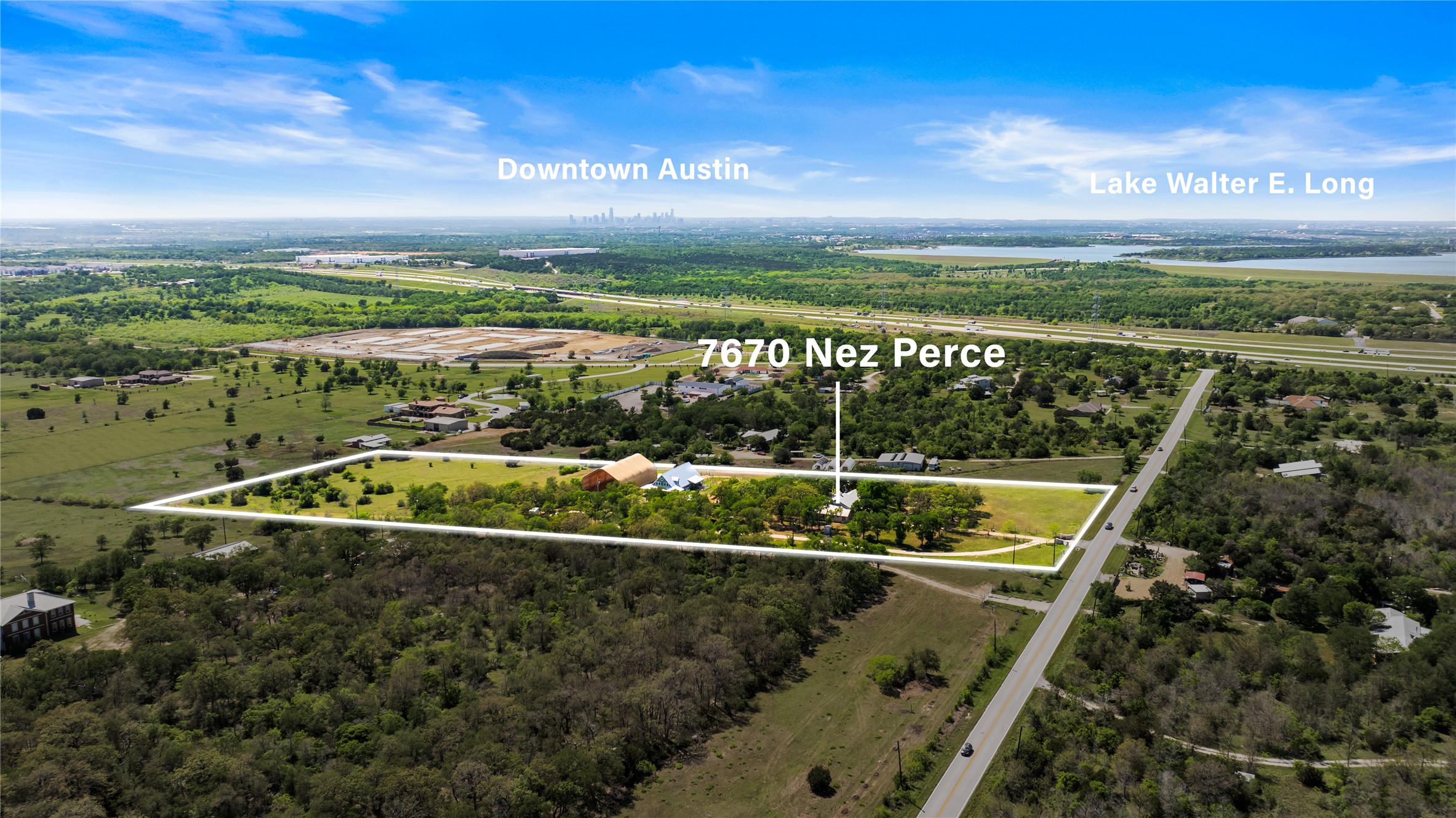 7670 Nez Perce Trace Manor, TX 78653 - Photo 3 of 40 Aerial view featuring a water view
