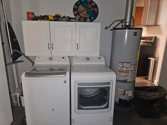 a utility room with dryer and washer