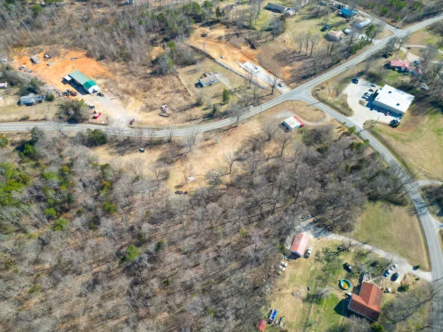 a backyard of a house with large trees