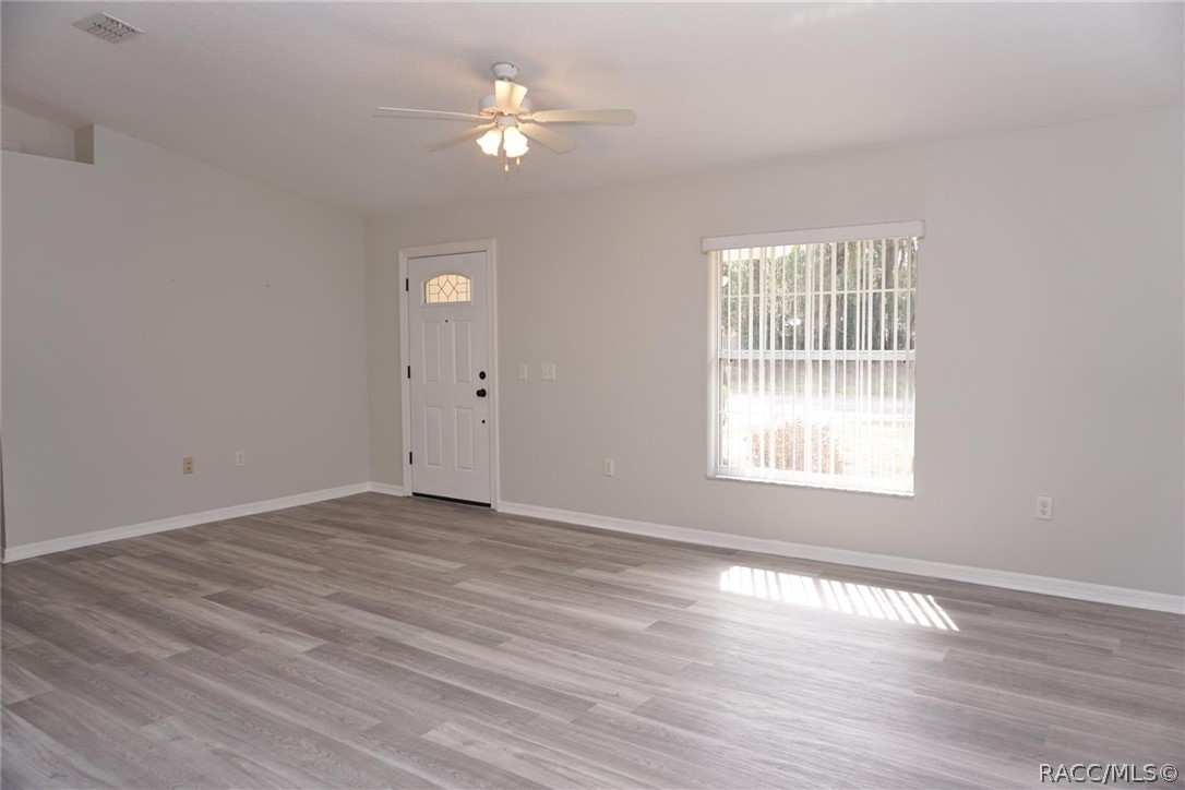 6079 East Penrose Street Inverness, FL 34452 - Photo 4 of 59 Spacious Living Room with all new flooring