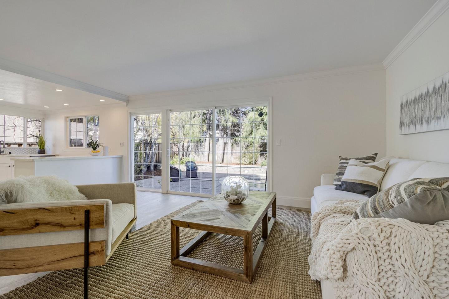 271 Spinnaker Street Foster City, CA 94404 - Photo 12 of 28 a living room with furniture and a large window