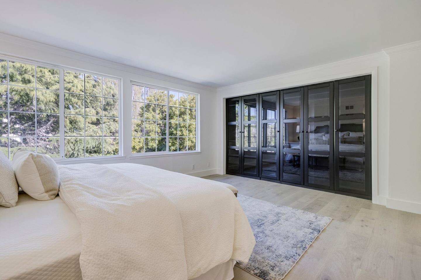 271 Spinnaker Street Foster City, CA 94404 - Photo 18 of 28 a bedroom with a large bed and large window
