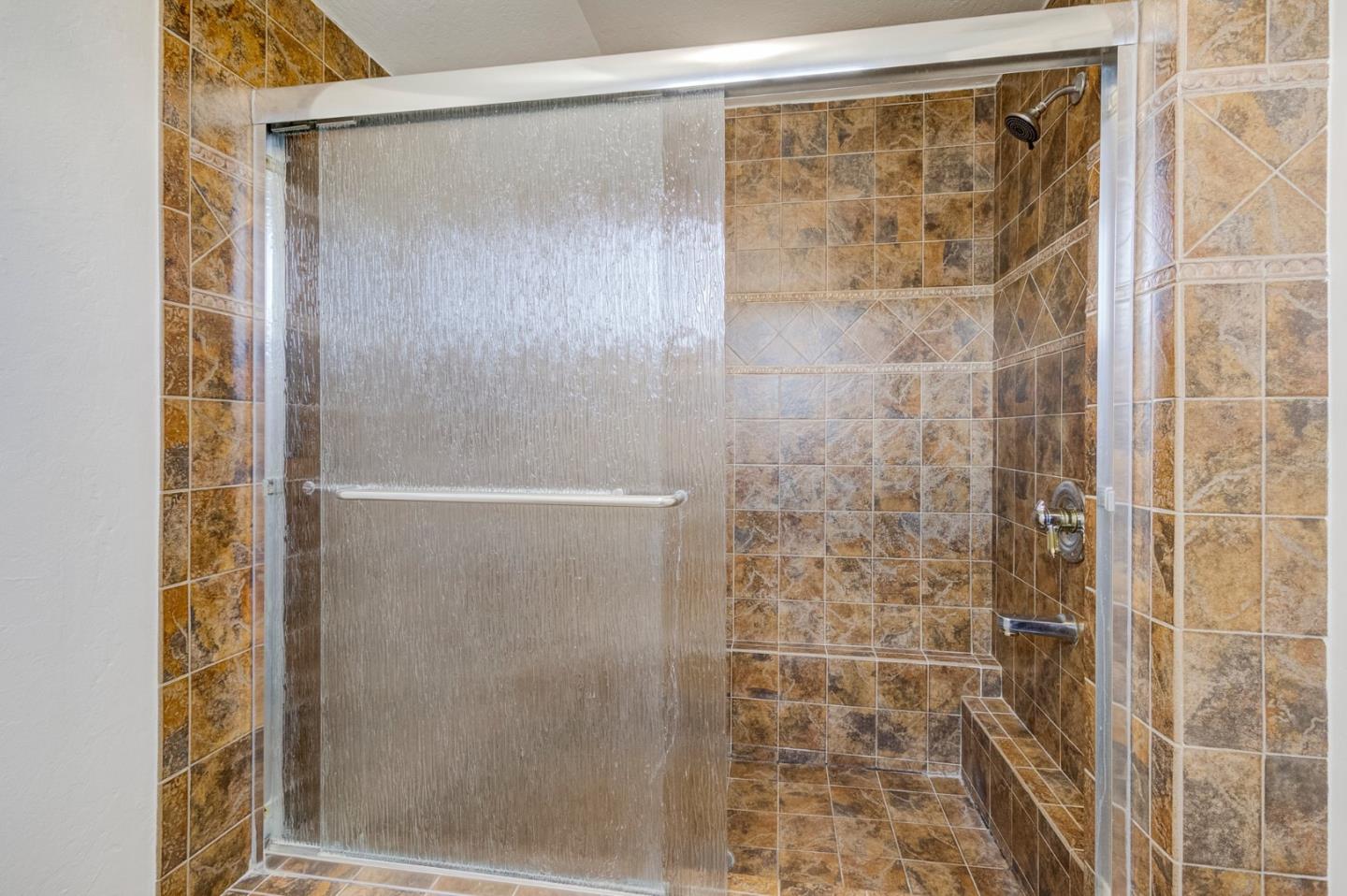 271 Spinnaker Street Foster City, CA 94404 - Photo 21 of 28 a bathroom with a glass shower door