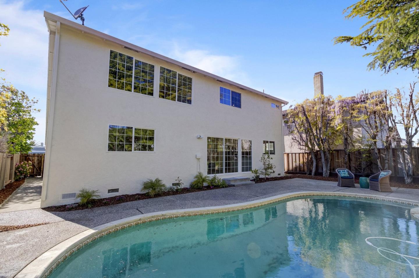 271 Spinnaker Street Foster City, CA 94404 - Photo 24 of 28 a swimming pool with outdoor seating