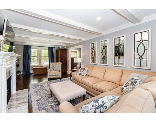 72 Badger Road Medford, MA 02155 - Photo 11 of 42 a living room with furniture and a fireplace