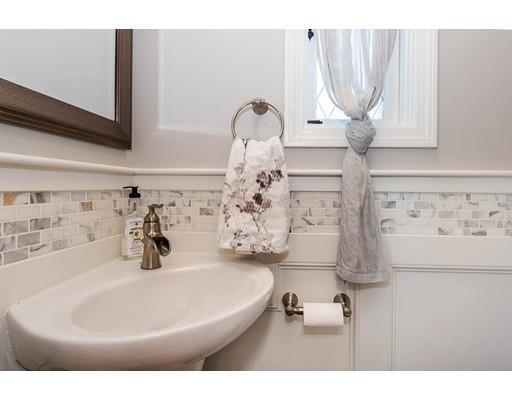 72 Badger Road Medford, MA 02155 - Photo 19 of 42 a bathroom with a sink and a mirror