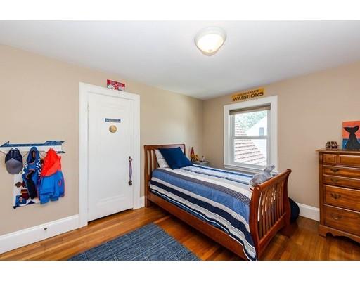 72 Badger Road Medford, MA 02155 - Photo 20 of 42 a bedroom with furniture and a window