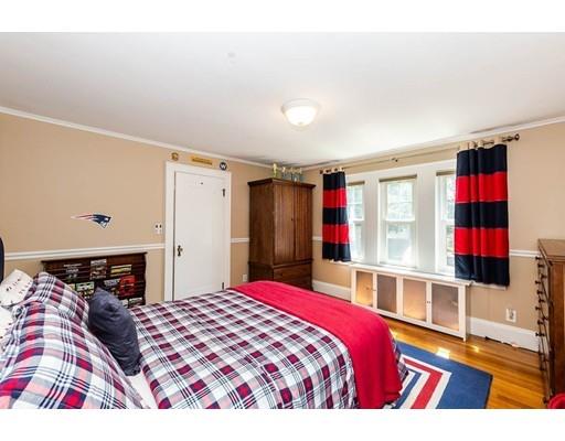 72 Badger Road Medford, MA 02155 - Photo 23 of 42 a bedroom with a bed and a large window