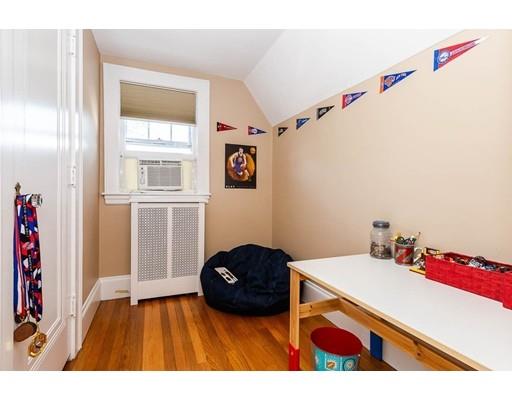 72 Badger Road Medford, MA 02155 - Photo 24 of 42 a bedroom with a bed and a window
