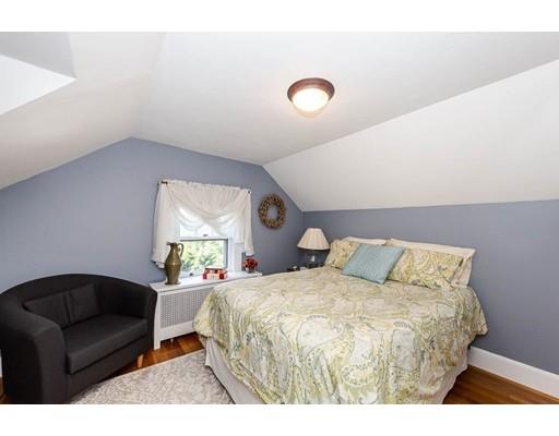 72 Badger Road Medford, MA 02155 - Photo 29 of 42 a bedroom with a bed window and couch