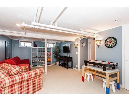 72 Badger Road Medford, MA 02155 - Photo 34 of 42 a living room with furniture a computer on the desk and chair
