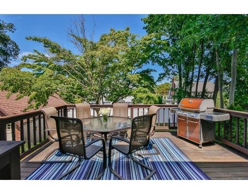 72 Badger Road Medford, MA 02155 - Photo 39 of 42 a view of a chairs and table on the deck