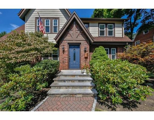 72 Badger Road Medford, MA 02155 - Photo 5 of 42 a front view of a house with a yard