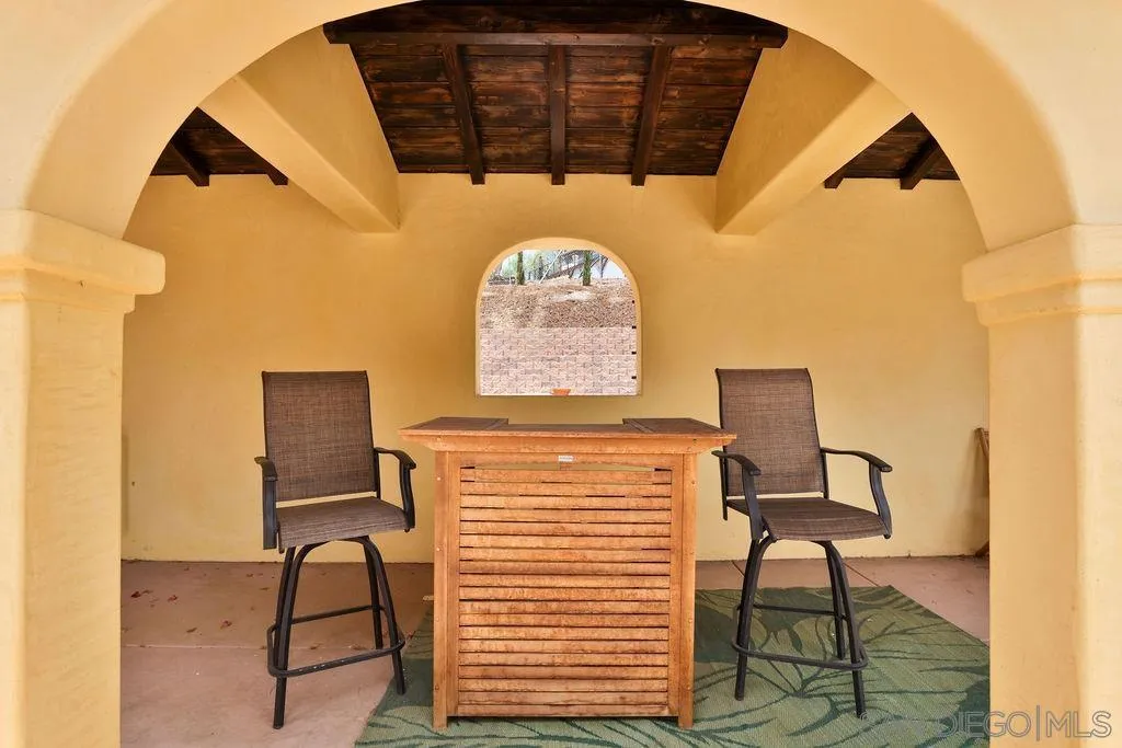 2038 Valley Rim Road El Cajon, CA 92019 - Photo 21 of 37 a view of entryway with a table and a chair