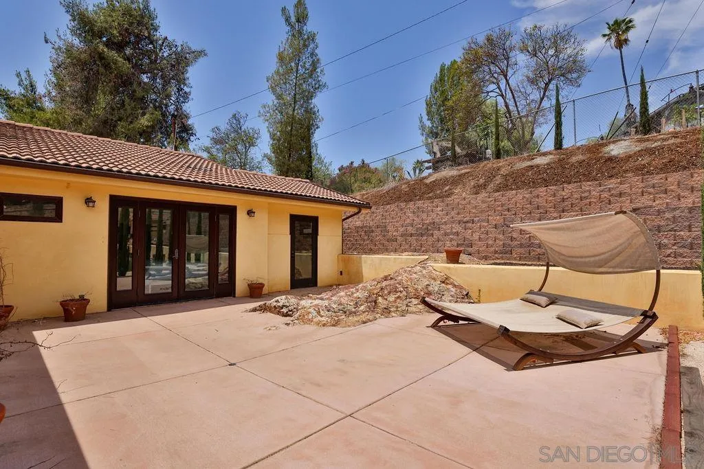2038 Valley Rim Road El Cajon, CA 92019 - Photo 30 of 37 a view of a house with a patio