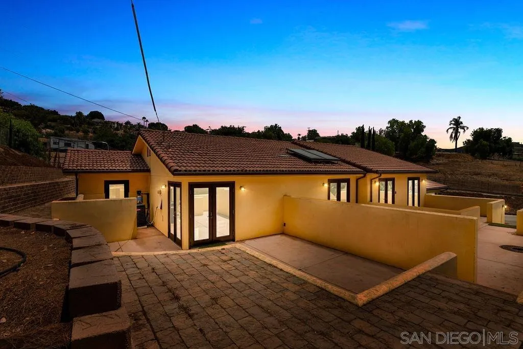 2038 Valley Rim Road El Cajon, CA 92019 - Photo 31 of 37 a view of a house with a backyard