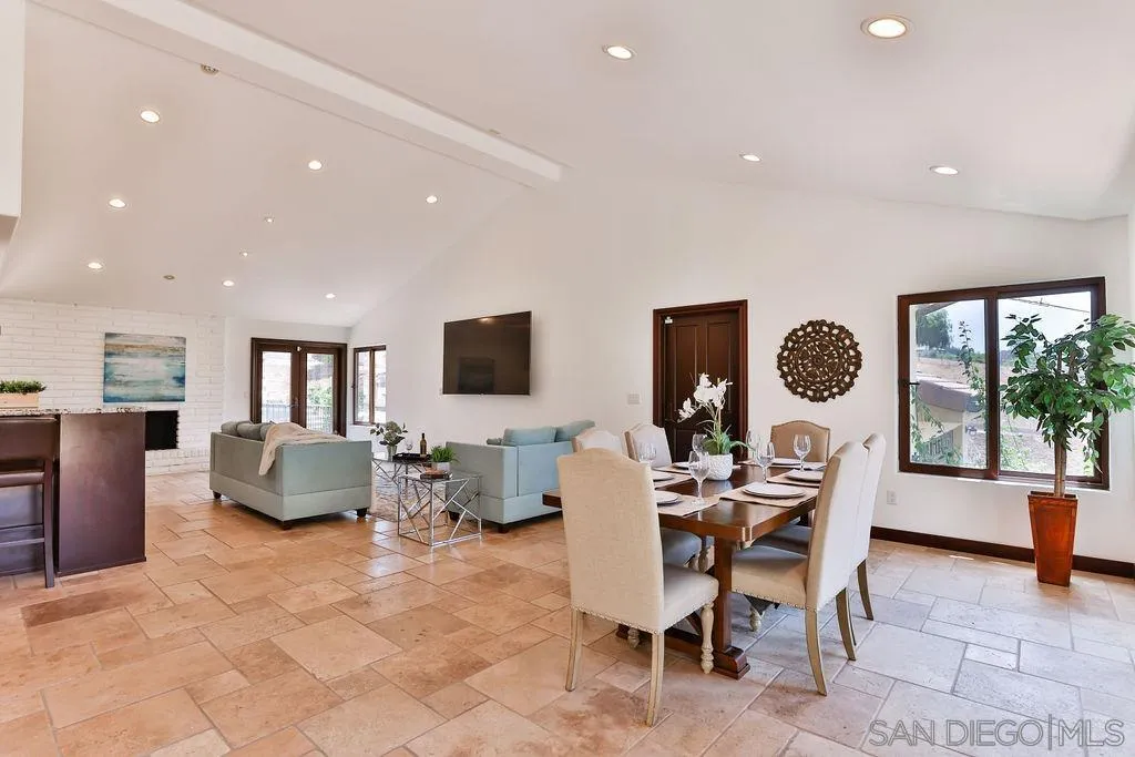 2038 Valley Rim Road El Cajon, CA 92019 - Photo 4 of 37 a dining room with furniture and a large window