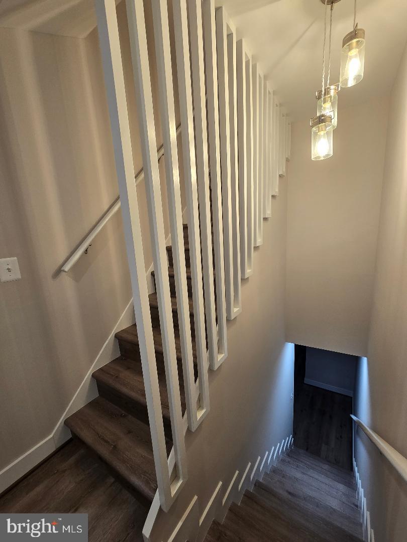 113 Edgewood Road Towson, MD 21286 - Photo 28 of 48 a view of entryway with stairs and wooden floor