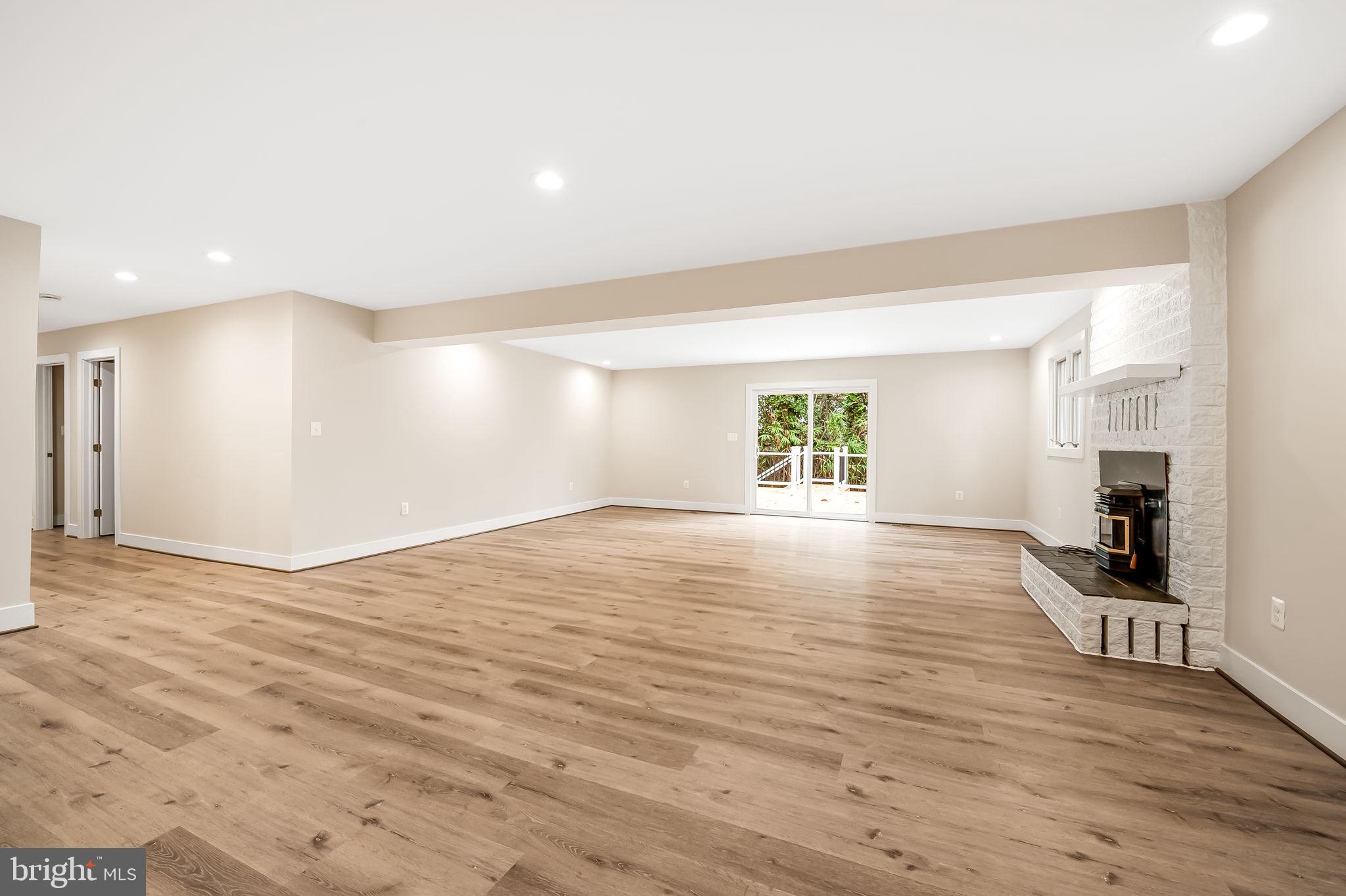 113 Edgewood Road Towson, MD 21286 - Photo 34 of 48 wooden floor in an empty room with a window