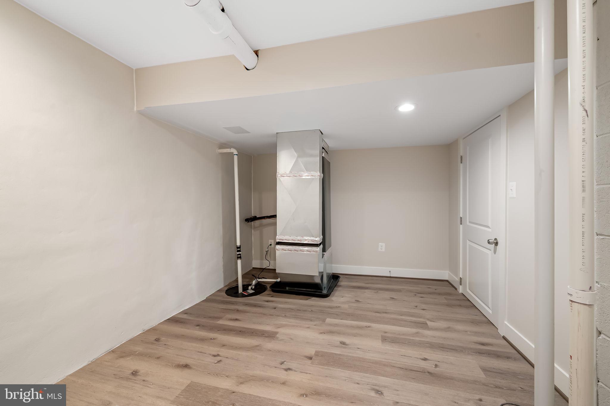 113 Edgewood Road Towson, MD 21286 - Photo 44 of 48 a view of a room with wooden floor