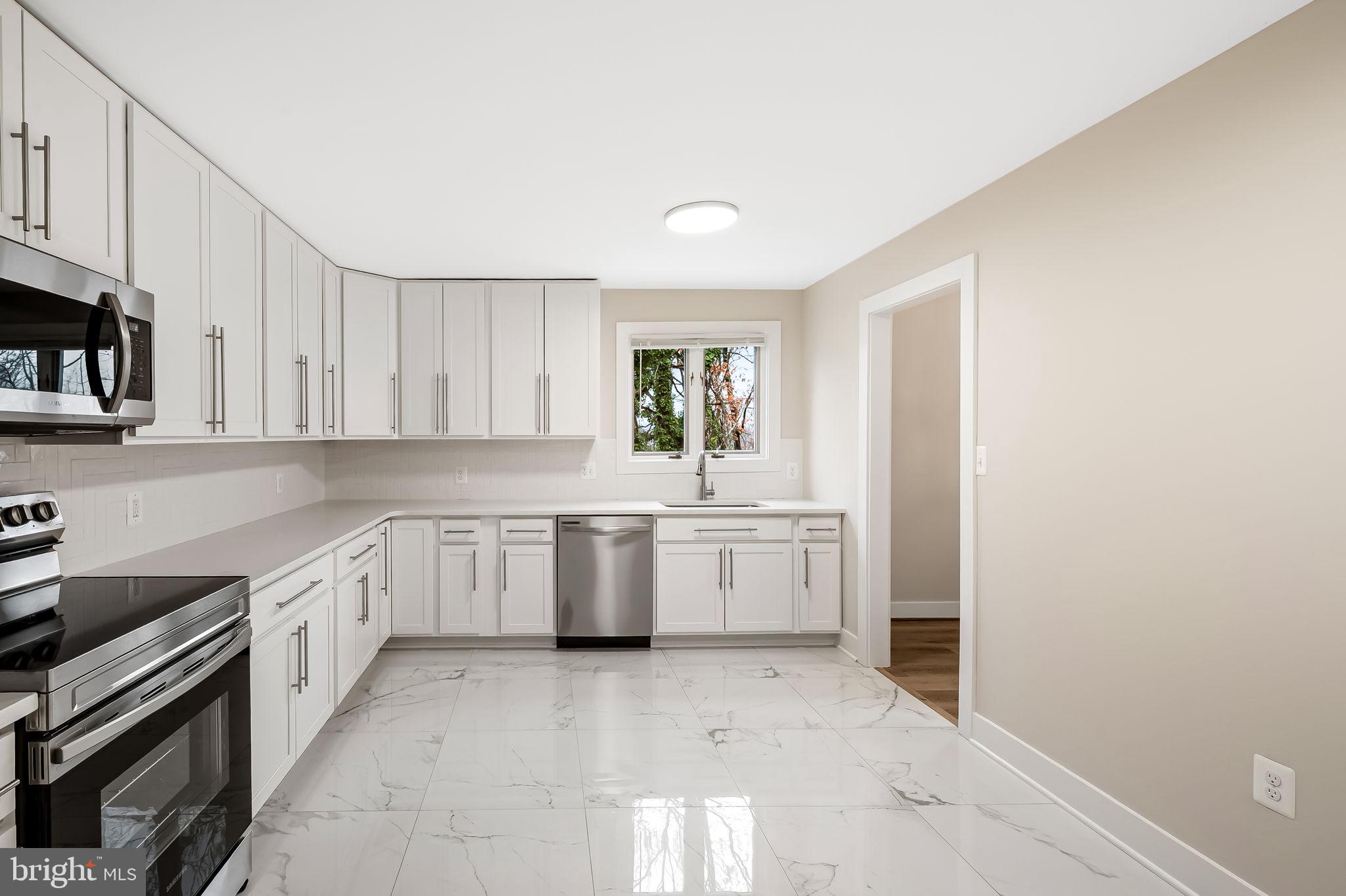 113 Edgewood Road Towson, MD 21286 - Photo 10 of 48 a kitchen with sink and cabinets