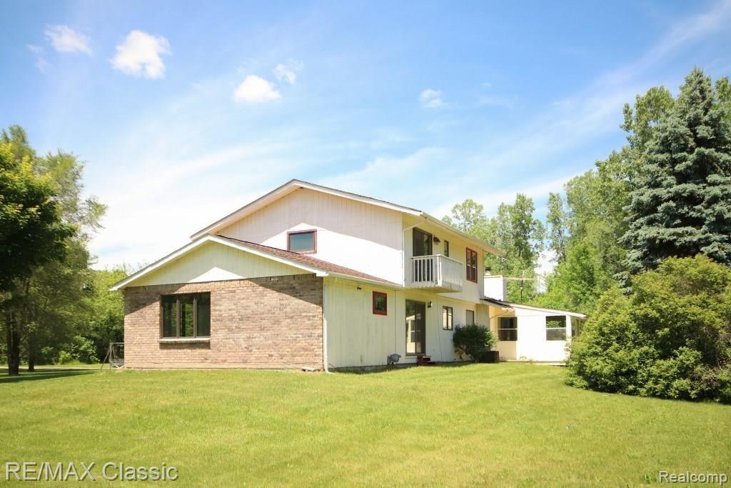 5701 Barr Road Canton, MI 48188 - Photo 5 of 47 Enjoy the view from the balcony or sunroom.