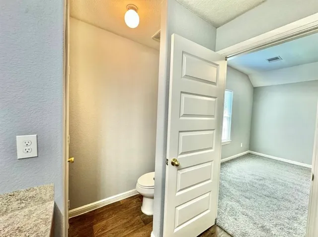 a bedroom with a bed and furniture