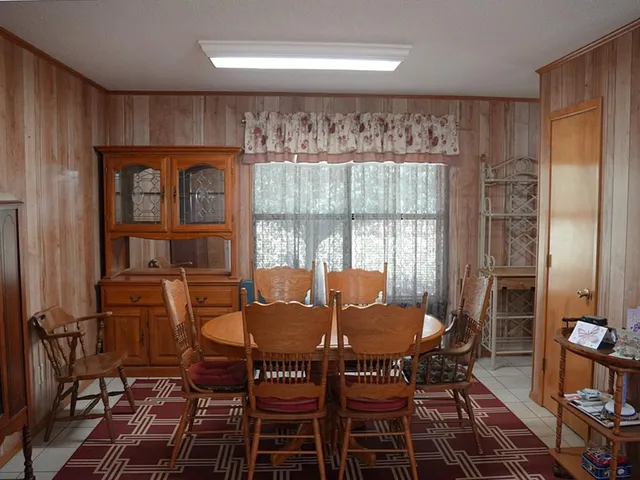 a utility room with dryer washer and other items