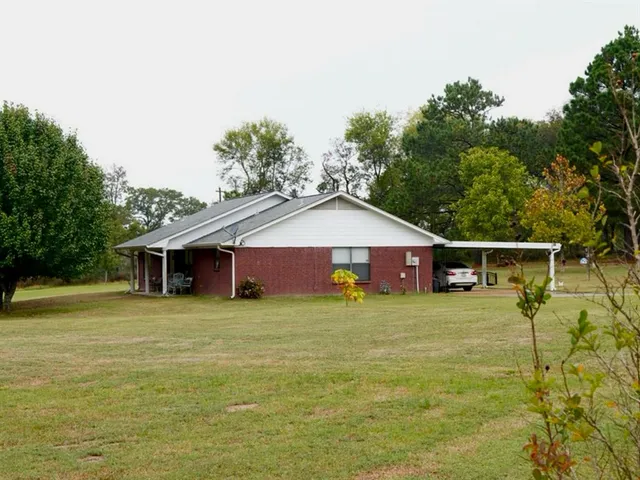 a house with a yard in front of it
