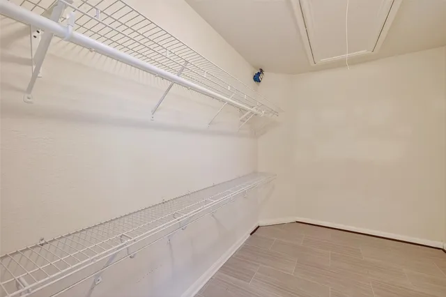a view of an empty walk in closet