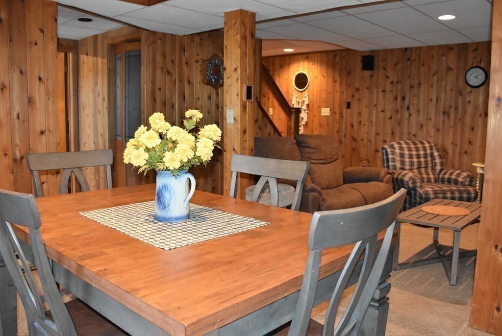 23 Bernie Road Holland, MA 01521 - Photo 18 of 36 a dining room with furniture and wooden floor