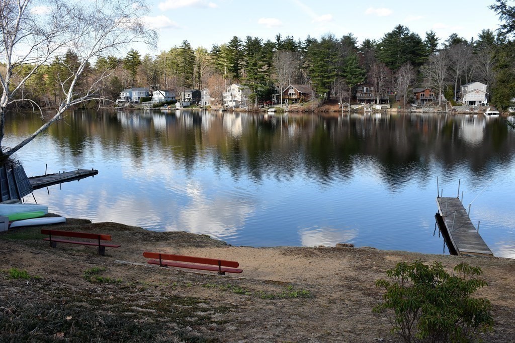23 Bernie Road Holland, MA 01521 - Photo 7 of 36 a view of a lake with boats and trees all around