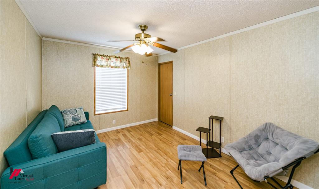 259 Kings Circle Grand Cane, LA 71032 - Photo 28 of 38 a bedroom with furniture and a window