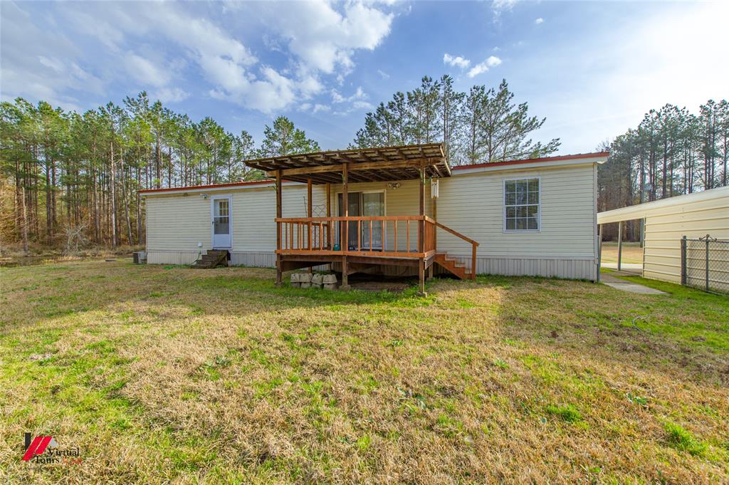 259 Kings Circle Grand Cane, LA 71032 - Photo 36 of 38 a view of a house with a backyard