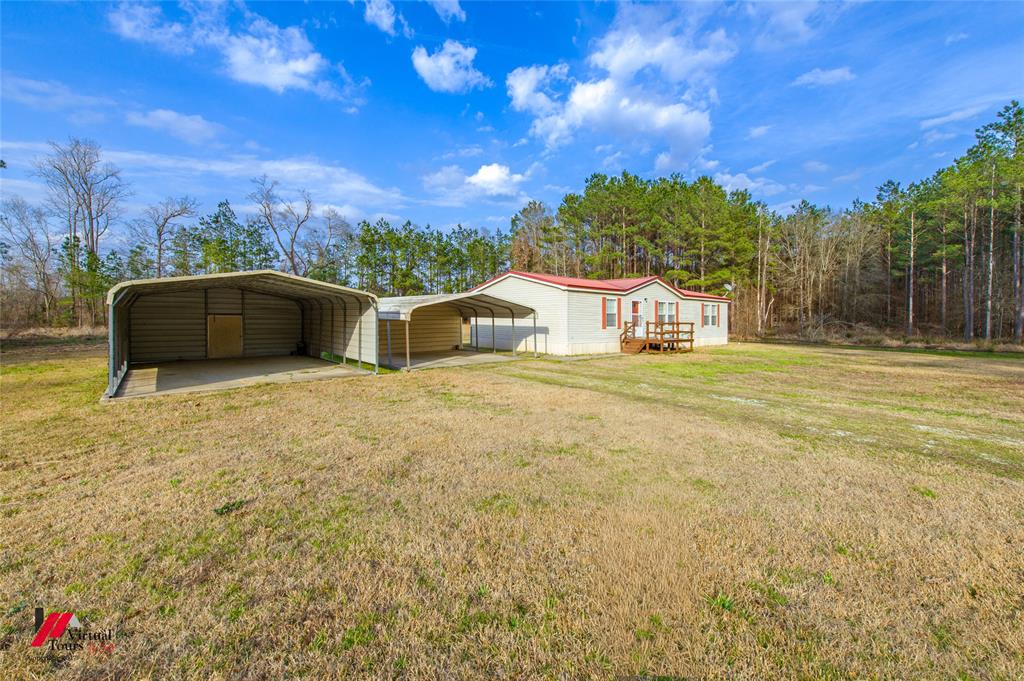 259 Kings Circle Grand Cane, LA 71032 - Photo 38 of 38 a view of a house with a yard