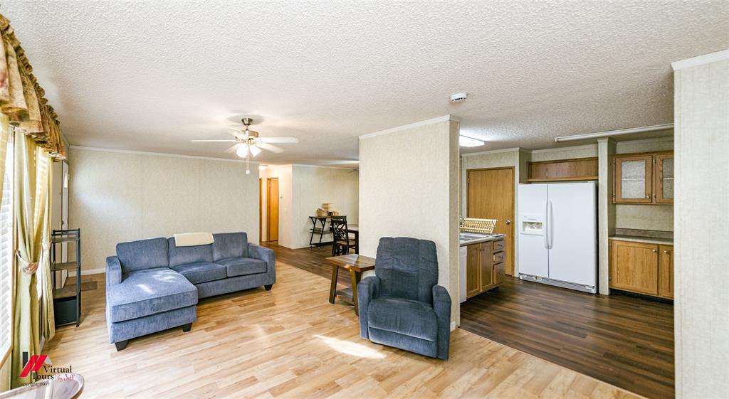259 Kings Circle Grand Cane, LA 71032 - Photo 7 of 38 a living room with furniture and a wooden floor