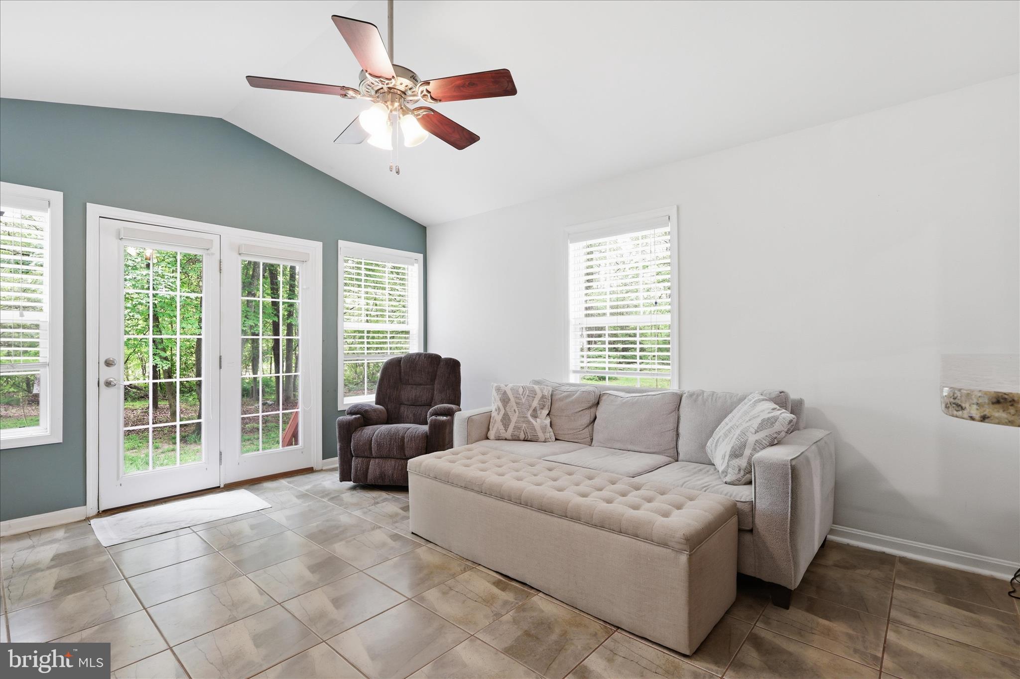 515 Shelton Shop Road Stafford, VA 22554 - Photo 11 of 52 a living room with furniture and a large window