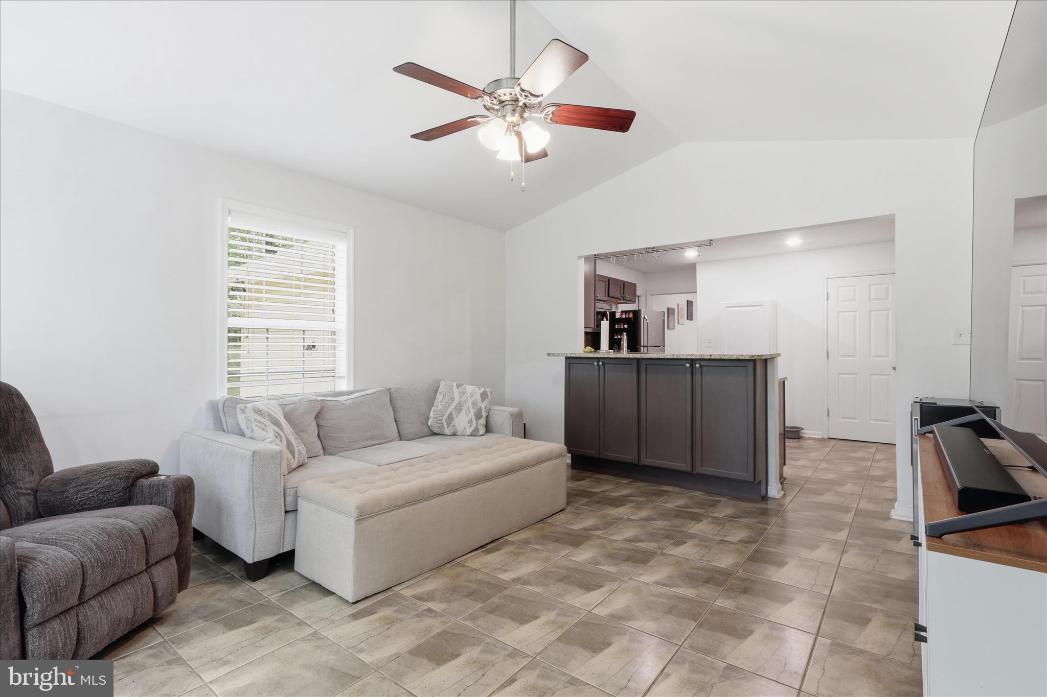515 Shelton Shop Road Stafford, VA 22554 - Photo 13 of 52 a living room with furniture and kitchen view
